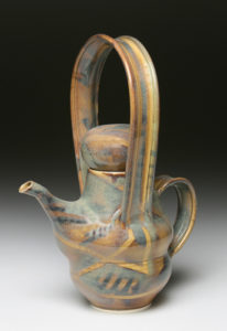 cross handle teapot